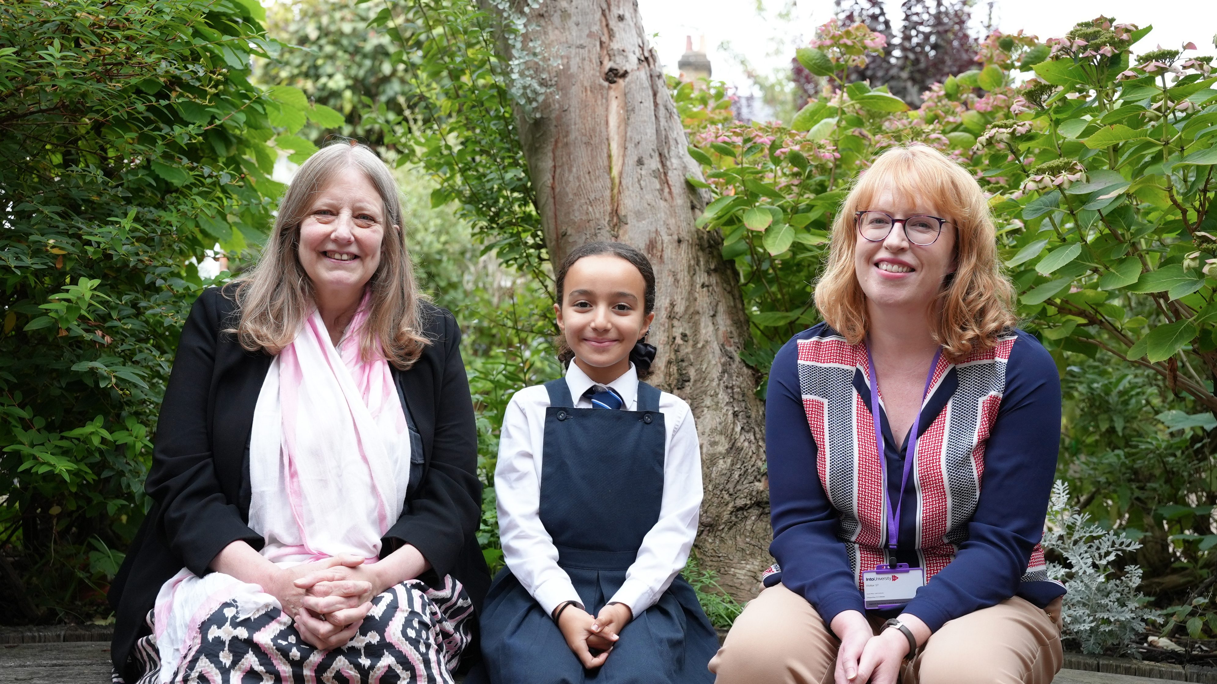 Photo of Dr Rachel Carr, CEO at IntoUniversity, Lisa, a student supported by IntoUniversity, and Bea Theakston, Investment Director at Impetus