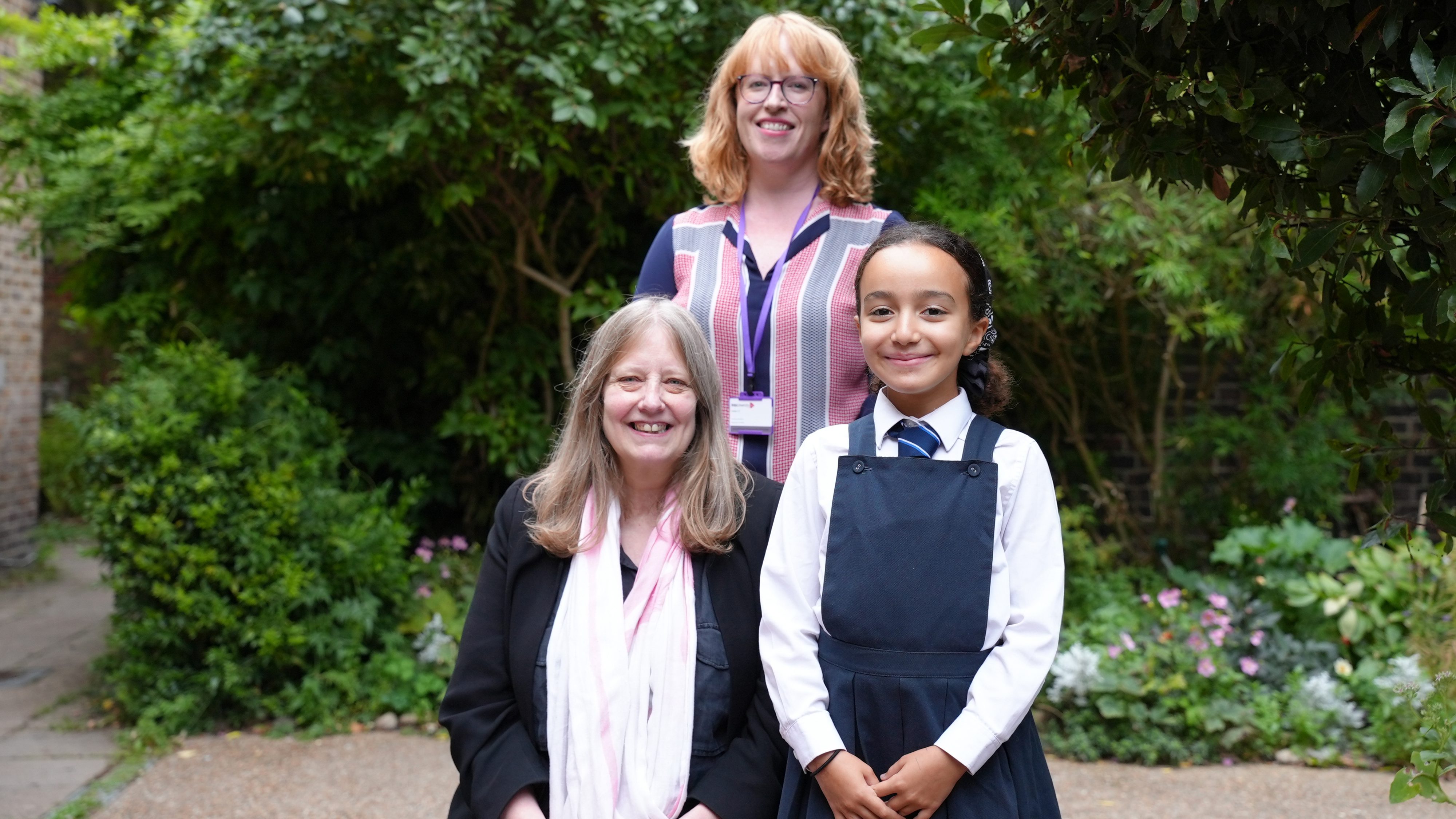 Photo of Dr Rachel Carr, CEO at IntoUniversity, Bea Theakston, Investment Director at Impetus, and Lisa, a student supported by IntoUniversity.